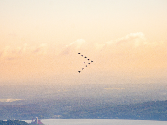 Two F-35 Lightning II aircraft flew in formation behind the Red Arrows.