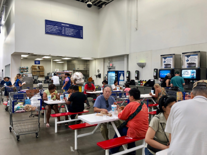 Soon, we found ourselves at a food court that was offering items like pizza, hot dogs, cheeseburgers, and sundaes.