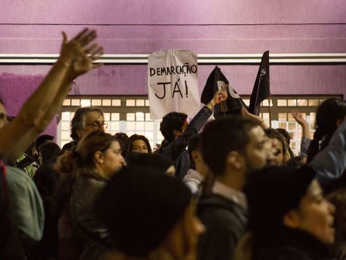 "Demarcation now," this poster says, highlighting a big problem of Bolsonaro