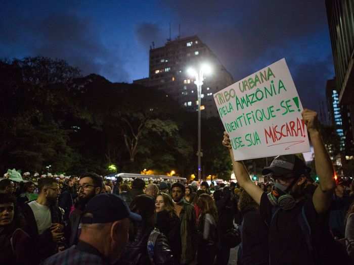 "Urban tribe, for Amazônia, show yourself. Put on your mask," this man