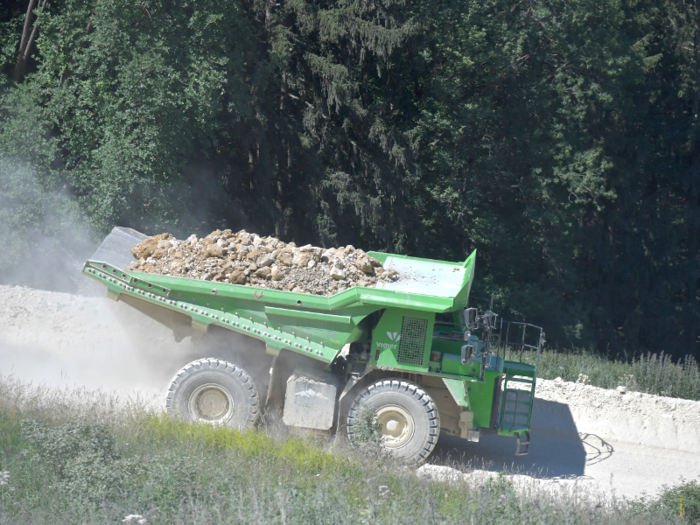 Fully loaded, it can transport 65 tons of mined rock downhill from the mountain. As it descends, its regenerative braking generates electricity.