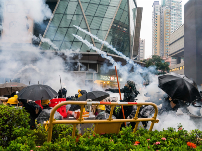  Protesters encountered police as they neared the endpoint, marked by makeshift roadblocks. Democratic Party legislator Andrew Wan reportedly tried to mediate and ask the police to wait for protesters to leave, but was unsuccessful. 