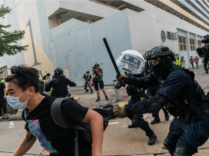 The policemen in riot gear and protesters who set up the makeshift street barricades ended up clashing outside a police station and near a shopping mall.