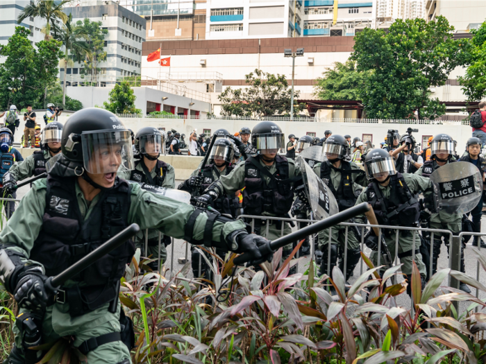  The march occurred in Kwun Tong at 1 p.m. Around 2:30 p.m., a group of protesters constructed makeshift street barricades and weapons. Police reportedly formed a defense line and urged protestors to disperse. 