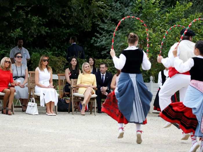 Macron, Trump, and Tusk were in the front row for a performance by traditional Basque dancers in the villa