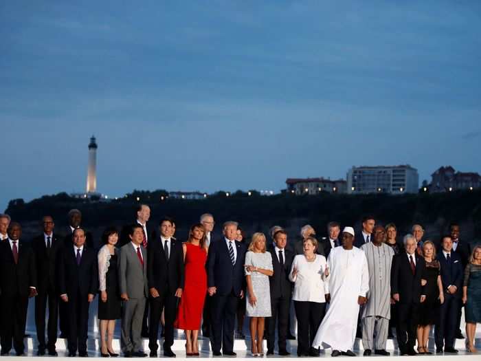 On Sunday night, the leaders gathered with their spouses and guests for a group photo.