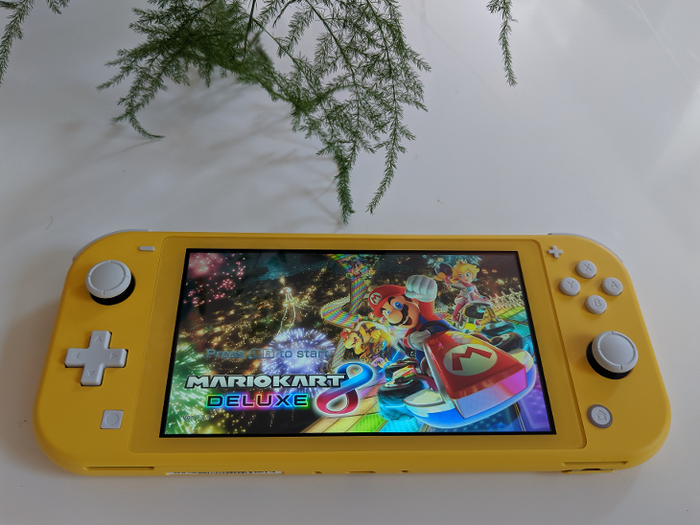 The Switch Lite did feel noticeably lighter than the original Switch, and a bit sturdier without the detachable Joy-Cons. The software and games seemed identical to the original Switch.