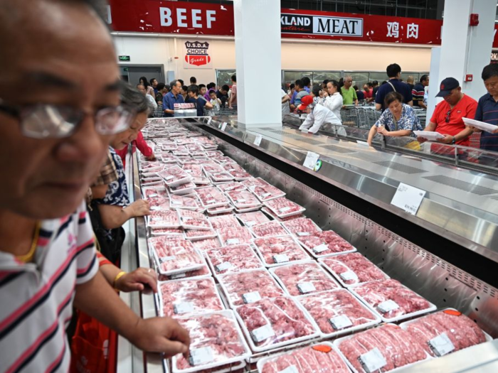 "There are discounts as the business is opening now," local Rick Zhou told the Financial Times. "Meat is cheap here."