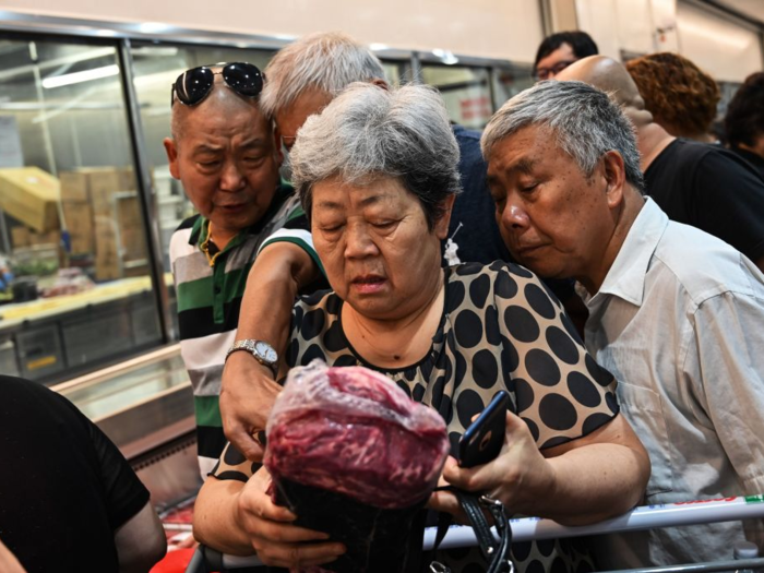 Photos from Getty Images and early reports from AFP and the Financial Times indicate that the warehouse