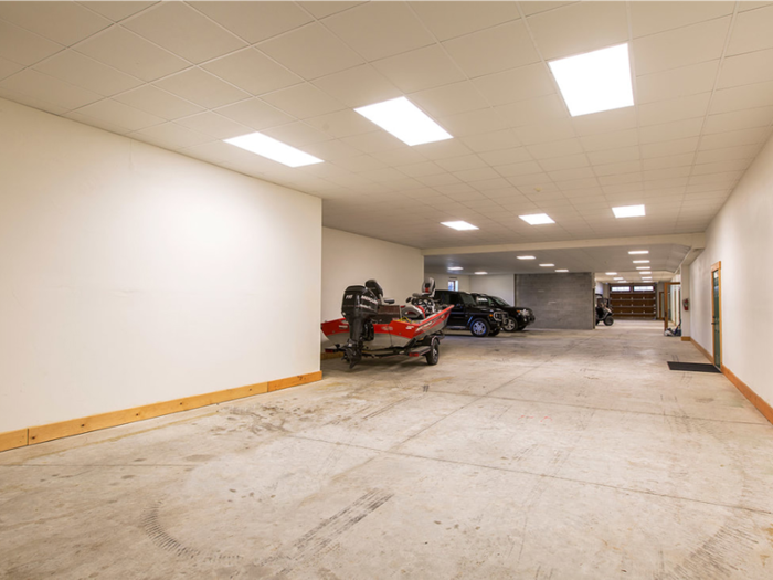 The almost 25,000 square foot home has a heated and cooled, 5,000 square foot 22-car garage. There’s also a 7,200 square foot steel equipment garage that can fit tractors and implements.