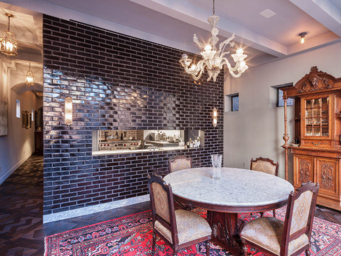 And those distinctive dining room walls? Antique bricks from Paris.