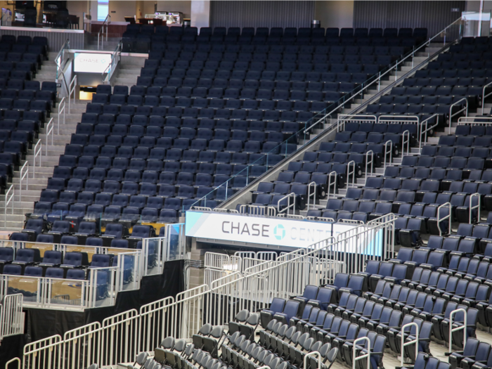 The seats in Chase Center are larger than Oracle Arena’s.