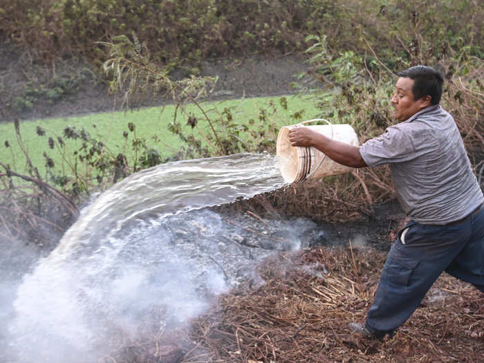 Here, a man does his best to douse a fire, but with tens of thousands of documented fires, it