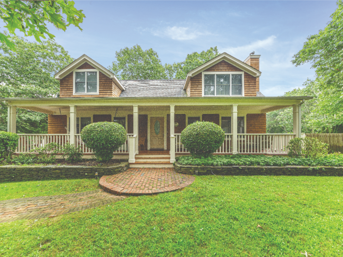 This 4-bedroom, 4-bathroom home on Spruce Street spans 2,100 square feet and is on the market for $1.095 million. The home boasts a wraparound cedar deck and a heated pool.