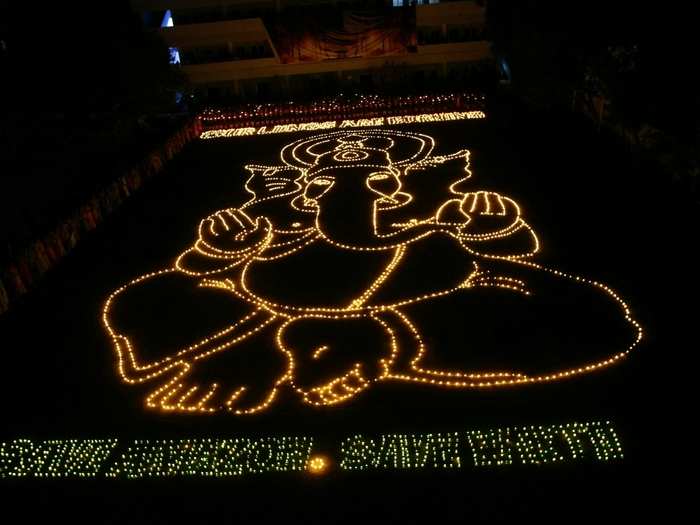 Two thousand students also prayed for the raging fires in the Amazon forest by forming a Ganesh idol with lamps.