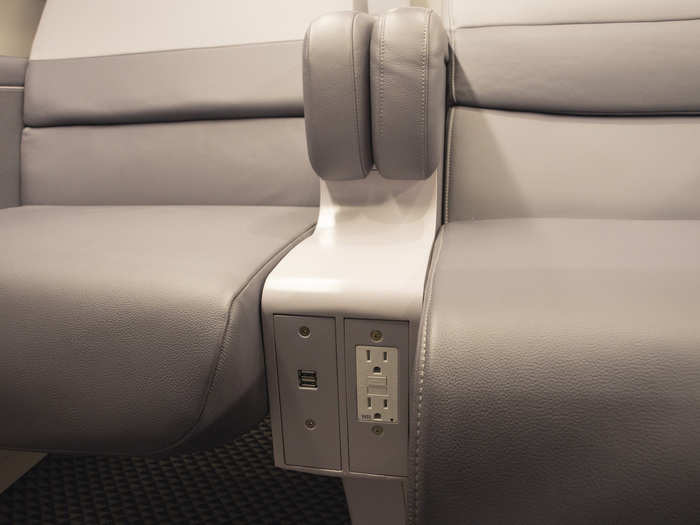 Every seat has a personal power outlet for charging phones, computers, and other devices. There are also USB ports and individual reading lights.