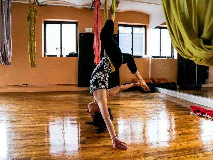 This eventually led to hanging upside down. We spent a while building up to "inversions," which involved leaning back in the hammock and looping our legs through in the style of aerial silks. This part was thrilling!