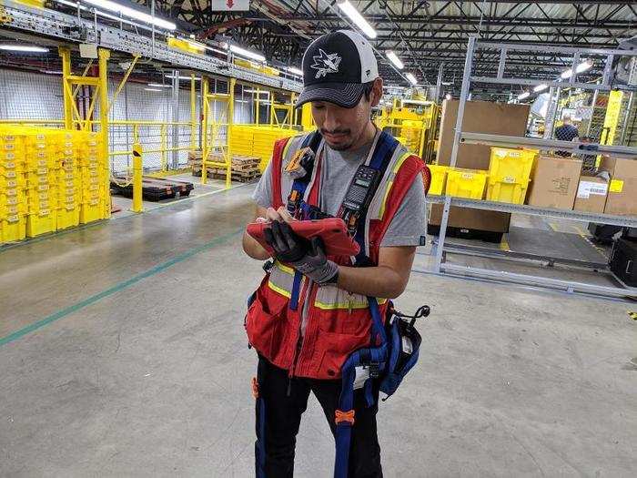 5. This gentleman wearing an array of tech gear, which lets him walk among the robots.