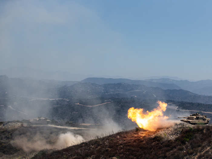 The Marines were given tires from the tanks, known as road wheels, and told to keep two hands on it at all times. To finish the PT test, the huffing participants competed in a one-mile boots and utes run. In the afternoon, the Marines began their shooting workup program.