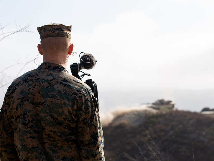 On the first day, the Marines woke up before the sun to compete in a physical training competition. The physical training test started with the longest two minutes imaginable. The Marines had two minutes to complete as many clean-and-presses with a 50 pound heat round.