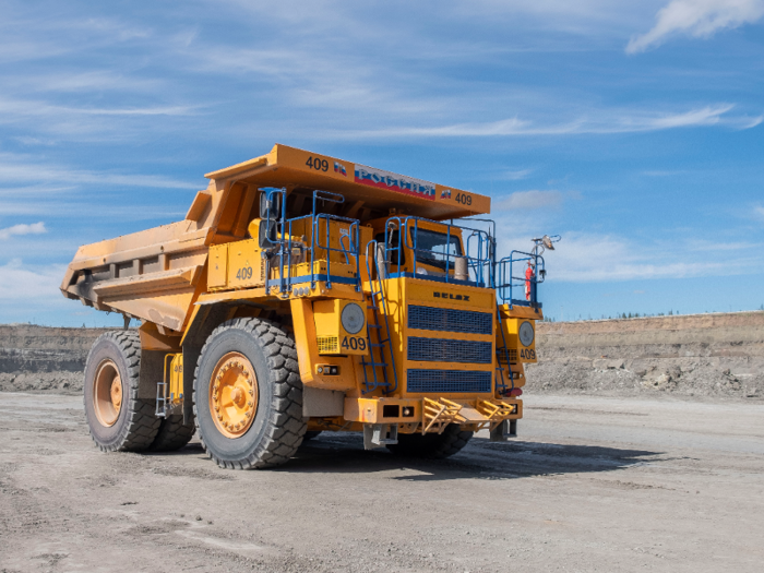 The trucks can carry about 90 tonnes — or almost 200,000 pounds — of soil or ore.