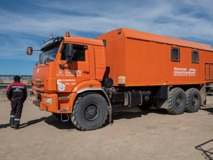 We climbed into a massive orange truck that would take us to the mine.