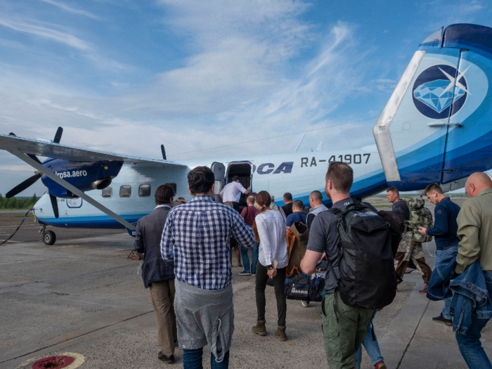 We boarded an Antonov AN-38-100, a small plane that can seat up to 27 people.