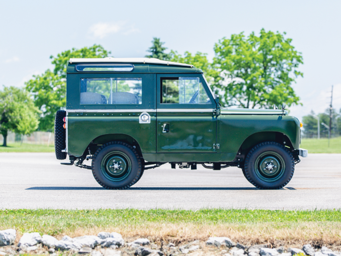 The Land Rover still has many of its original features that have been repaired during restoration, including the seats, interior parts, tires, and license plate.