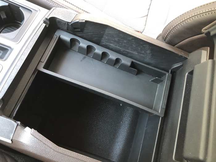As with all full-size pickups, the F-150 has oodles of storage, including this cavernous compartment under the front armrest.