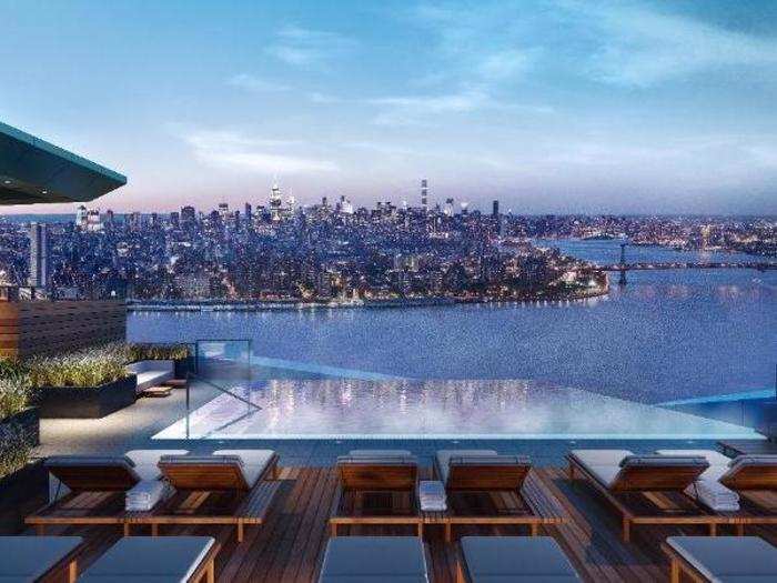 The building has 40,000 square feet of amenities and boasts the highest residential infinity pool in the Western Hemisphere, which is, fittingly, located on the rooftop.