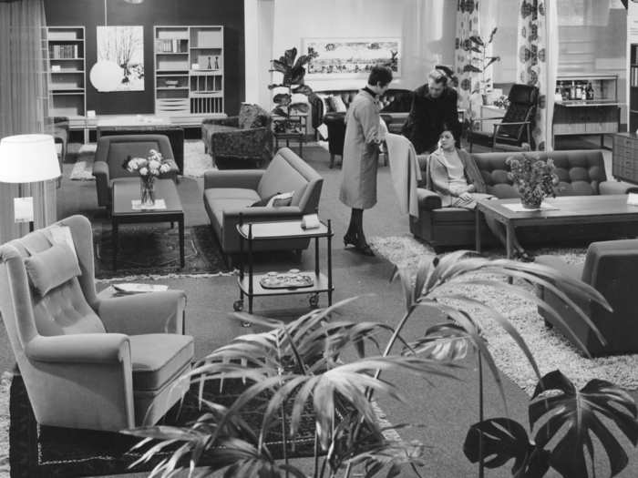 The showrooms in the Älmhult store featured various furniture displays. This 1964 showroom included the Milan Sofa (right), the Björkö sofa and chair (left), and a betting table with casters (center).