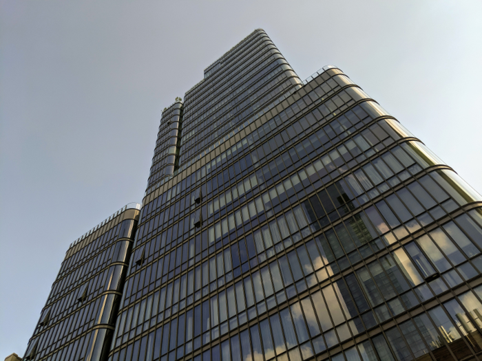 From the street-level, you can see some trees or shrubbery peaking slightly over the terrace