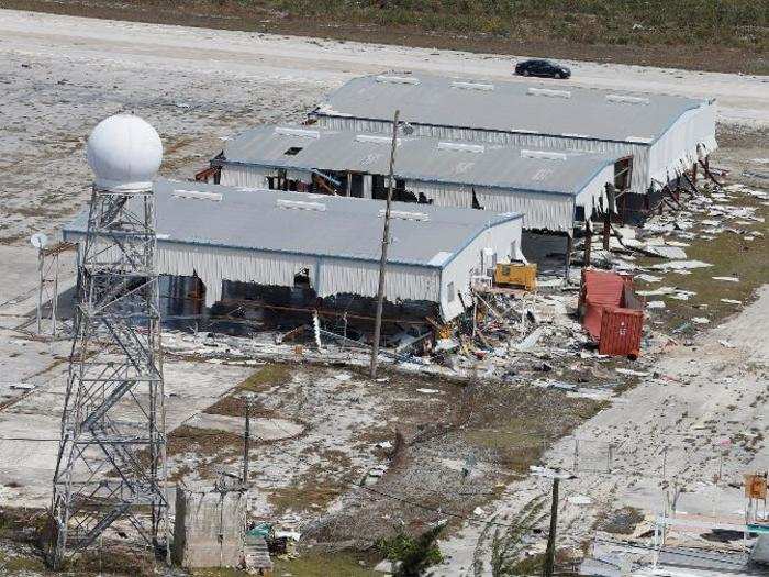 The airport is "a debris field" following the storm, according to CNN reporter Patrick Oppmann.