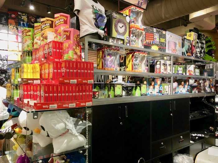 It seemed like this store had something for everyone. Behind the register, there were some more knickknacks and random items including snacks and hair accessories.