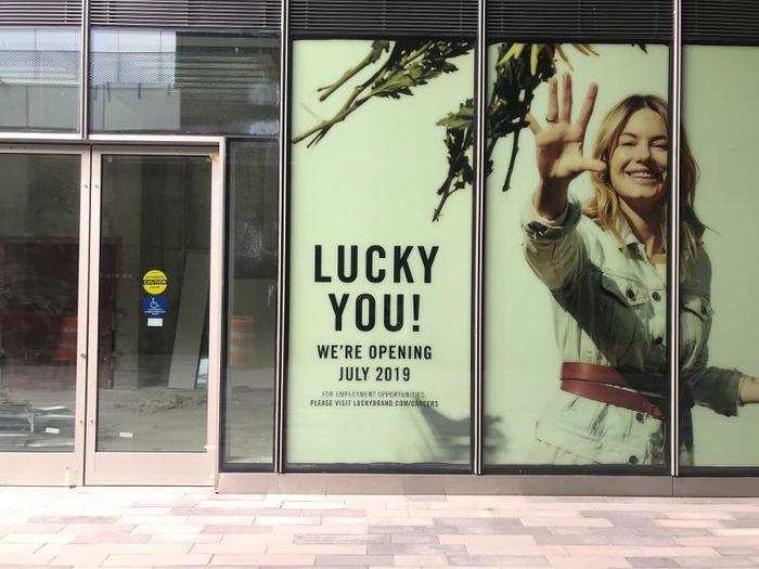 Near the Shake Shack, we an unopened Lucky Brand store, despite a sign declaring it would open in July.