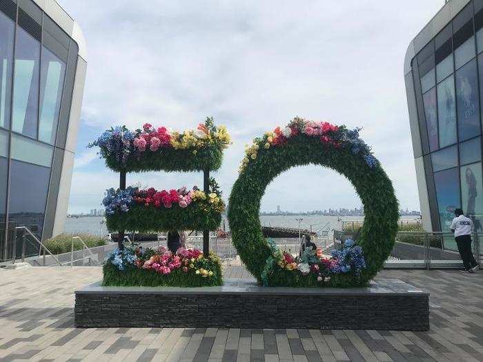 We saw several people waiting to post in front of this floral "EO" sign.