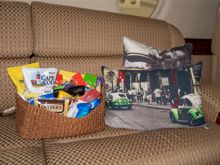 Water bottles and a basket of snacks are placed on board before each charter.