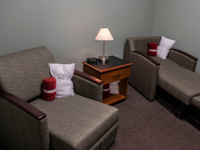 Pilots can get some shut-eye in a windowless rest area where small pillows and blankets are provided.