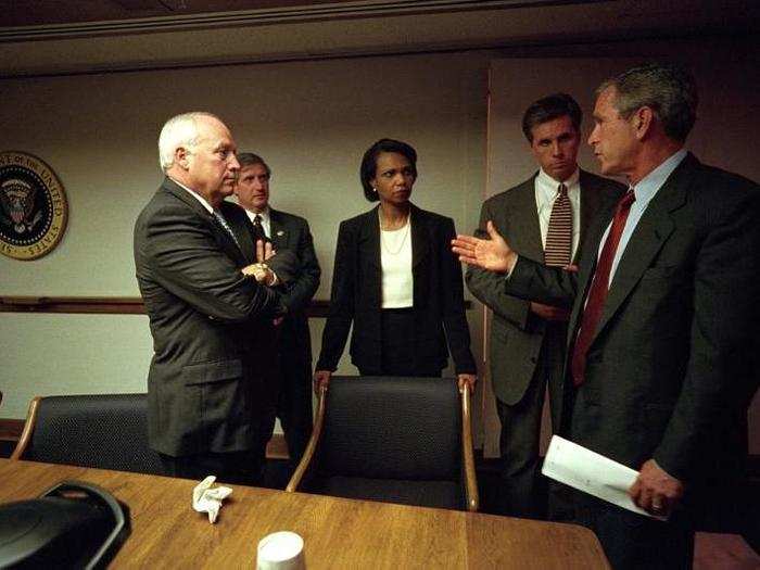 After returning to the White House, Bush meets with, from left, Vice President Dick Cheney, Chief of Staff Andy Card, National Security Adviser Condoleezza Rice, and Special Agent Carl Truscott of the US Secret Service, in the President