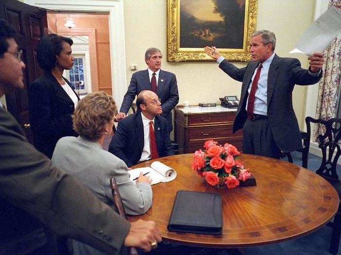 Working with his senior staff, Bush reviews the speech that he will deliver to the nation in the evening.