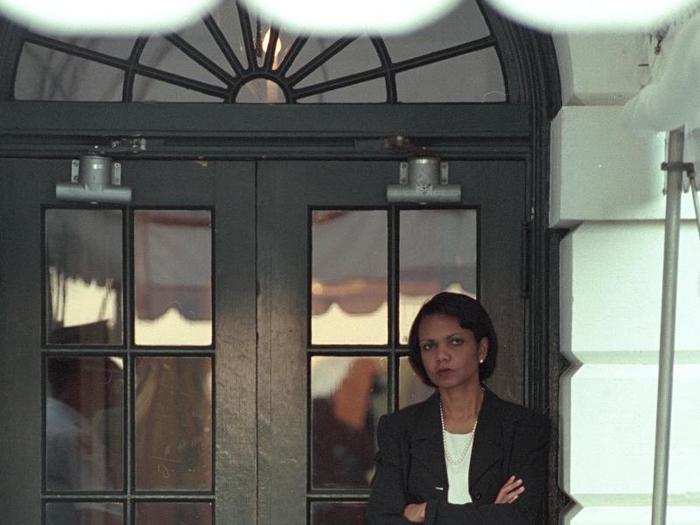 National Security Adviser Condoleezza Rice waits at the South Portico for Bush to arrive at the White House.