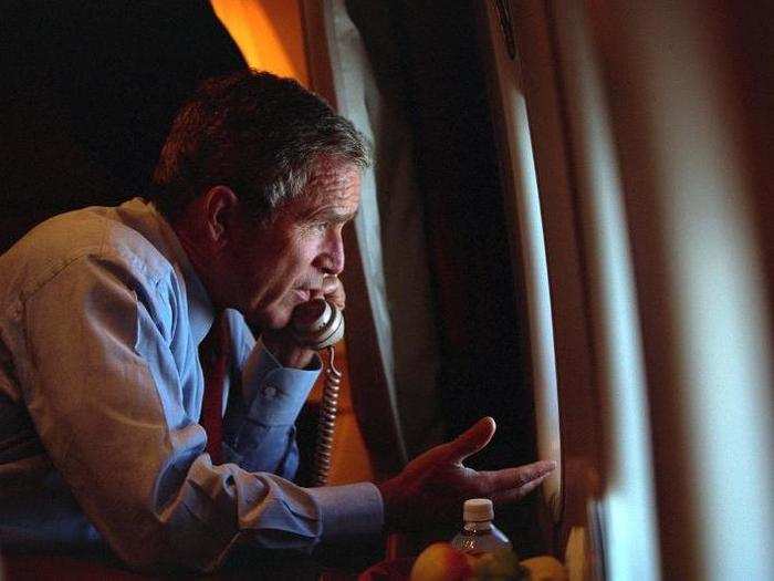 After departing Offutt Air Force Base for Washington, DC, Bush talks on the phone with Vice President Dick Cheney from Air Force One.