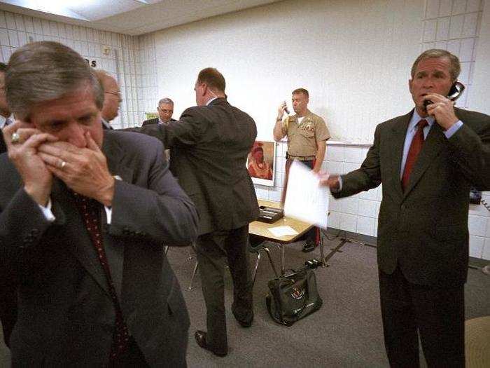 Bush calls New York Gov. George Pataki, FBI Director Robert Mueller, and Vice President Dick Cheney. White House Chief of Staff Andy Card talks on a cellphone.