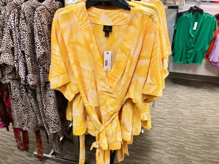 Nothing really jumped out to us here, but we did notice some options that seemed somewhat stylish, like this wraparound yellow top for $37.