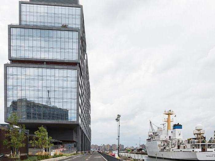 Dock 72 standing side-by-side with a boat, blending with the Navy Yard.