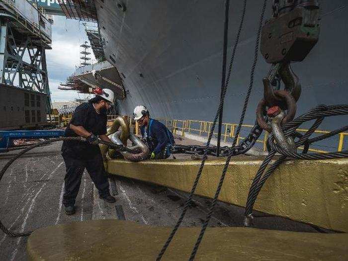 During the overhaul process, the shipbuilders determined that a George Washington anchor needed to be replaced. They opted to swap it out for one of the anchors on the former Enterprise.