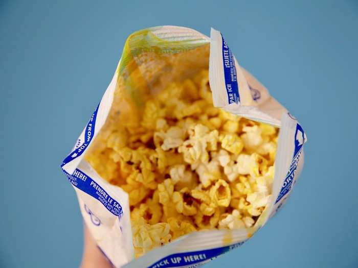 The Pop Secret bag looked like the popcorn we would actually eat in a movie theater. The bright yellow buttery color made us want to sit back and grab a Coke.