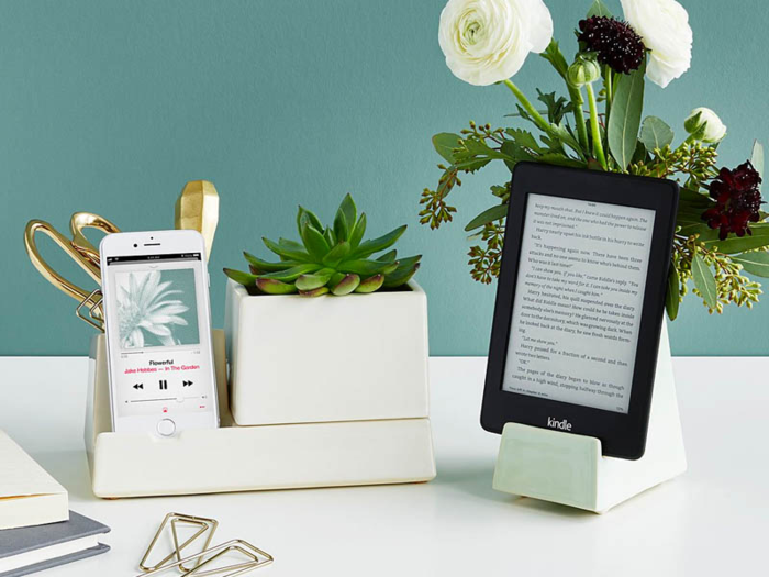 A phone dock that also holds flowers