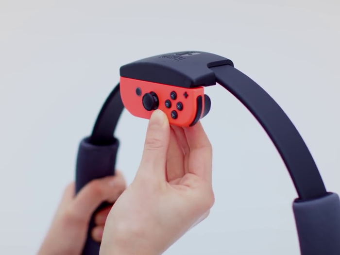 Both the Ring-Con and the Leg Strap have slots to hold the Nintendo Switch