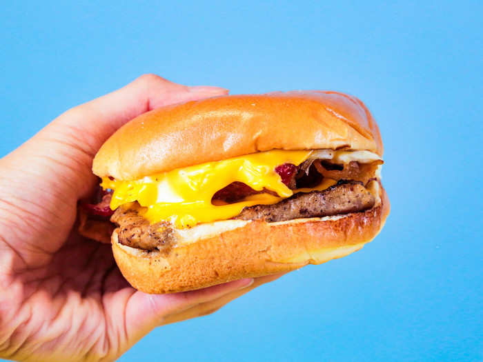 The Breakfast Baconator replaces the two beef patties in the classic Baconator with a square sausage patty and a round fried egg. True to its name, it also has a ton of bacon.